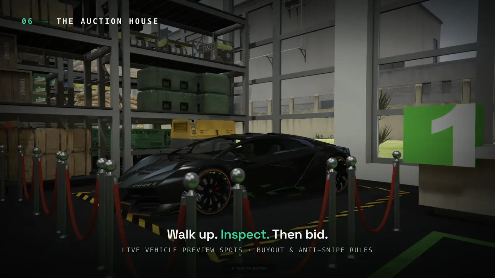 Black supercar parked behind red velvet ropes on a numbered vehicle preview spot inside an auction house warehouse