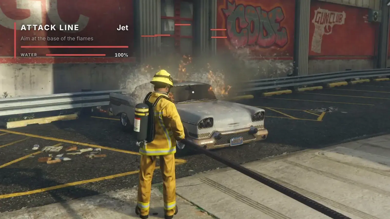 A firefighter sprays a burning car beside a red gun-club wall, with the hydrant line's card top left at 100 % water
