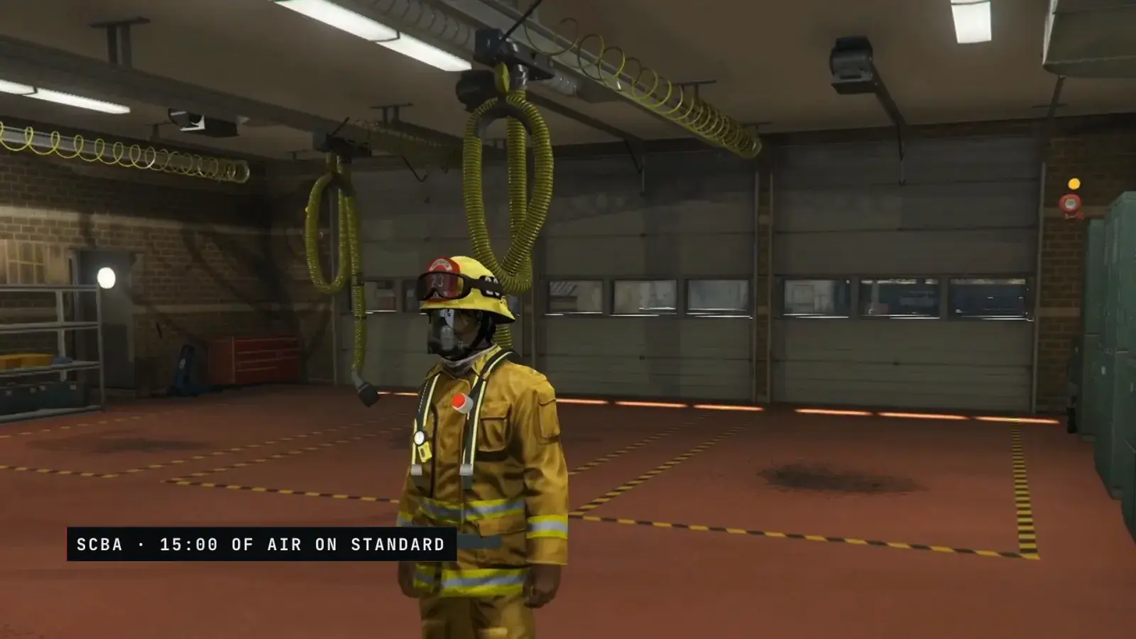 A firefighter in turnouts, mask and breathing apparatus stands in the station's engine bay
